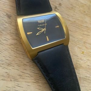 Black & gold analog vestal watch